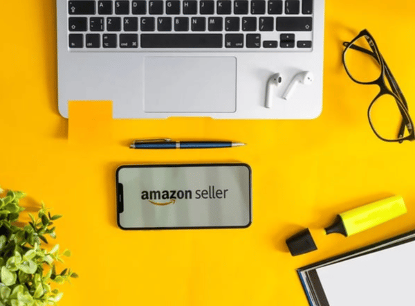 A laptop and smartphone showcasing Amazon seller feature